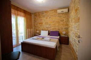 Postel nebo postele na pokoji v ubytování Villa Vergia