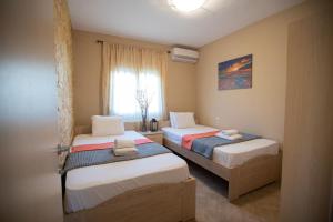 Postel nebo postele na pokoji v ubytování Villa Vergia