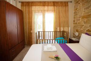 Postel nebo postele na pokoji v ubytování Villa Vergia