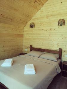Postel nebo postele na pokoji v ubytování Cabana Bahna
