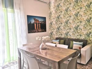 Khu vực ghế ngồi tại Casa Vacanze Marco Polo +14 ảnh