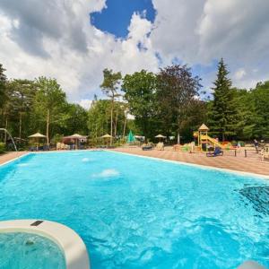 Zdjęcie z galerii obiektu Chalet Wanama. Gelegen op het vakantiepark Het Lierderholt op de veluwe. w mieście Beekbergen