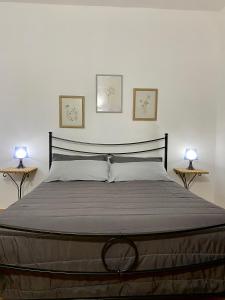 Posteľ alebo postele v izbe v ubytovaní Villa Chiara