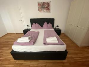 Posteľ alebo postele v izbe v ubytovaní Apartment Domino