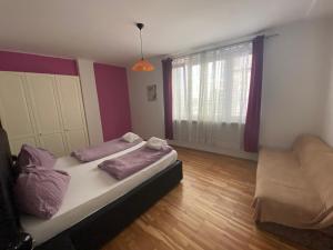 Posteľ alebo postele v izbe v ubytovaní Apartment Domino