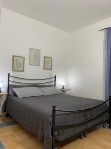 A bed or beds in a room at Villa Chiara