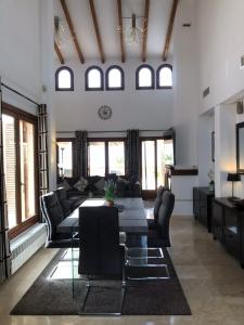 a living room with a couch and a table at Casa Calida in Murcia