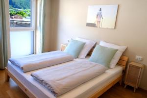 Posteľ alebo postele v izbe v ubytovaní Apartment Plantitsch - Alpstay + 10 fotografií