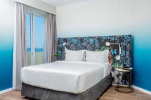 Postel nebo postele na pokoji v ubytování Mercure Rio Boutique Hotel Copacabana