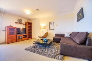 Posedenie v ubytovaní Bonito apartamento al lado de la playa con vistas al mar
