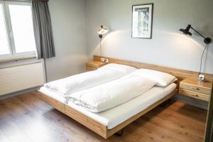 Postel nebo postele na pokoji v ubytování Berggasthaus Crest'ota