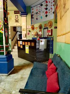 a room with a bed in the middle of a store at The Roof Backpackers in Guadalajara