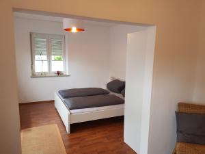 Postel nebo postele na pokoji v ubytování Ferienwohnung im Springerhof