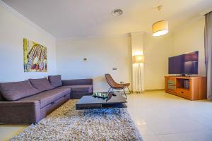 TV a/nebo společenská místnost v ubytování Estupendo apartamento con vistas al mar
