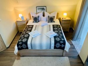 Posteľ alebo postele v izbe v ubytovaní Apartamenty u Magika