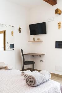Postel nebo postele na pokoji v ubytování B&B Gonare