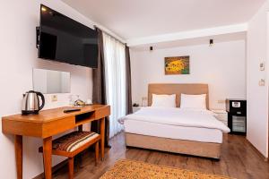 Voodi või voodid majutusasutuse Neda Hotel Istanbul toas
