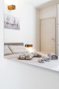 Postel nebo postele na pokoji v ubytování B&B Gonare