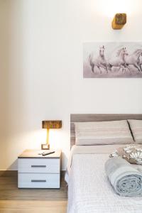 Postel nebo postele na pokoji v ubytování B&B Gonare