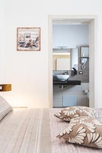 Postel nebo postele na pokoji v ubytování B&B Gonare