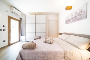 Postel nebo postele na pokoji v ubytování B&B Gonare