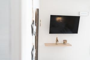 TV a/nebo společenská místnost v ubytování B&B Gonare