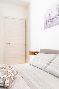 Postel nebo postele na pokoji v ubytování B&B Gonare