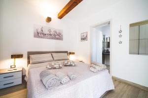Postel nebo postele na pokoji v ubytování B&B Gonare