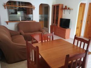 Telewizja i/lub zestaw kina domowego w obiekcie casa vacacional Veramar 2 Vera Playa