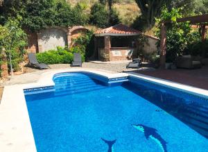 The swimming pool at or close to Studio Views Apartment, Cortijo Fruitful Hills