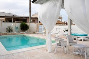 Imagen de la galería de I Gufi Bed & Breakfast Marzamemi, en Marzamemi