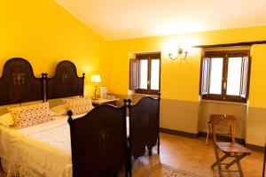 Postel nebo postele na pokoji v ubytování Villa Pardi