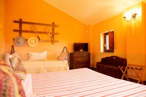 Postel nebo postele na pokoji v ubytování Villa Pardi