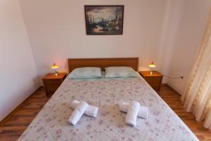 Postel nebo postele na pokoji v ubytování Apartman Budimir1