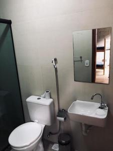A bathroom at Recanto Praia Grande