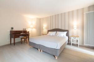 Posteľ alebo postele v izbe v ubytovaní Antico Borgo B&B Cannobio