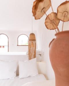 Cama ou camas em um quarto em Villa Fulô
