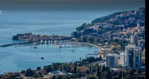 an aerial view of a city and a body of water at Luxury Apartments Mia in Budva
