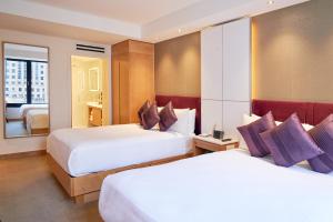 Postel nebo postele na pokoji v ubytování Concorde Hotel New York