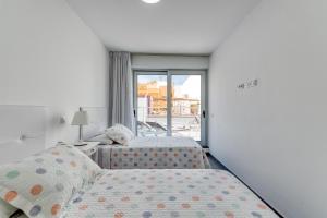 Posteľ alebo postele v izbe v ubytovaní Amarre Paradise