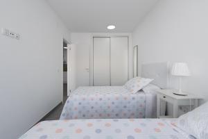 Posteľ alebo postele v izbe v ubytovaní Amarre Paradise