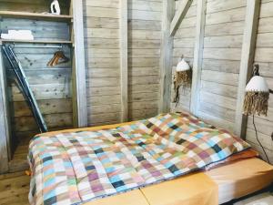 Ένα ή περισσότερα κρεβάτια σε δωμάτιο στο Le Bougainvillier Blanc