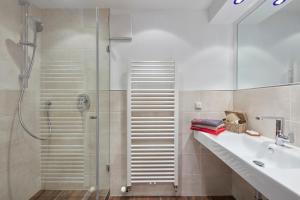 Koupelna v ubytování Ferienhaus Brunnau + 43 fotografií