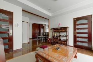 a living room with a glass table and a living room at KB1*Unique HUGE house for family /JR +subway in Osaka