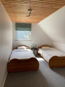 Postel nebo postele na pokoji v ubytování Holiday home Slokas
