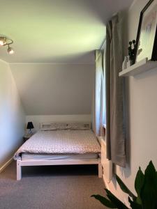 Postel nebo postele na pokoji v ubytování Holiday home Slokas
