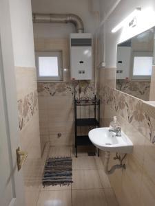 Napsugár apartmanház tesisinde bir banyo