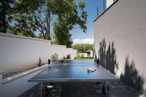 Stolní tenis v ubytování Villa Nalani nebo okolí