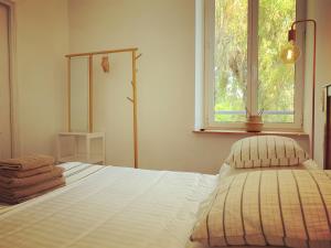 Ένα ή περισσότερα κρεβάτια σε δωμάτιο στο Hotel Alexandra - Boutique Hotel
