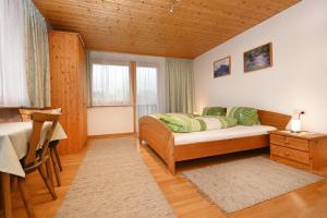 Letto o letti in una camera di Haus Valuga